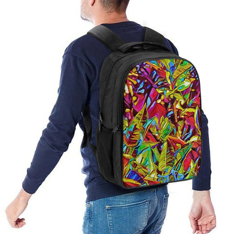 Person wearing a colorful backpack with a vibrant leaf pattern on a white background